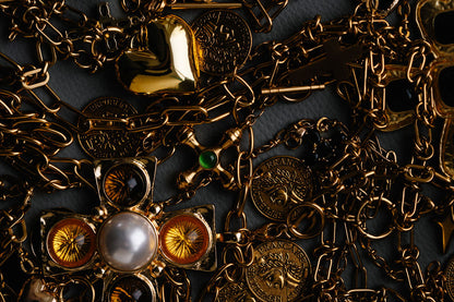 Fine paper clip choker with swirl sun