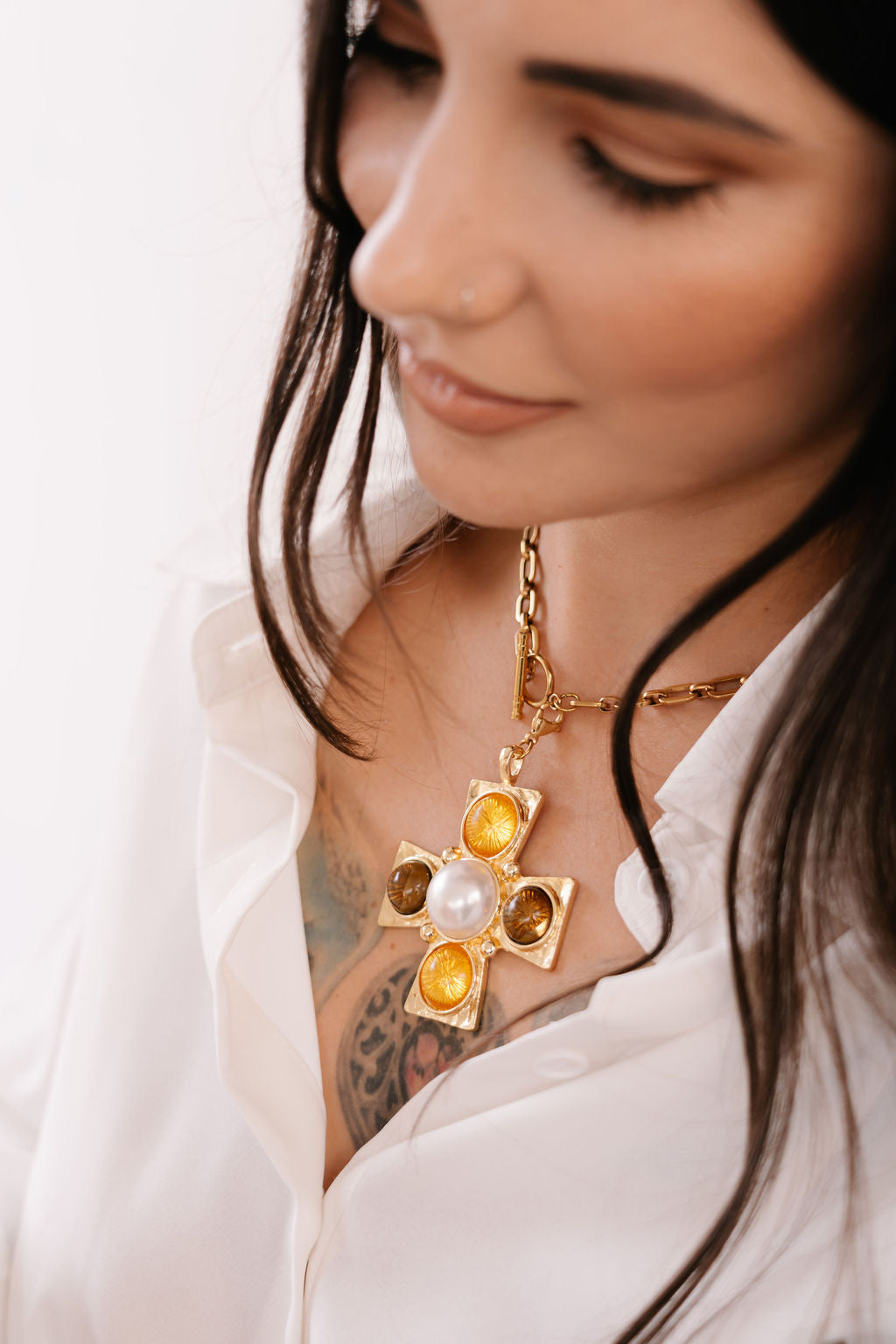 Medium chunky chain with toggle, extra large cross featuring yellow white and brown stones