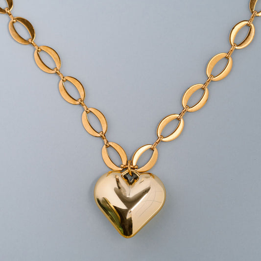 Hollow oval shape chain with large heart
